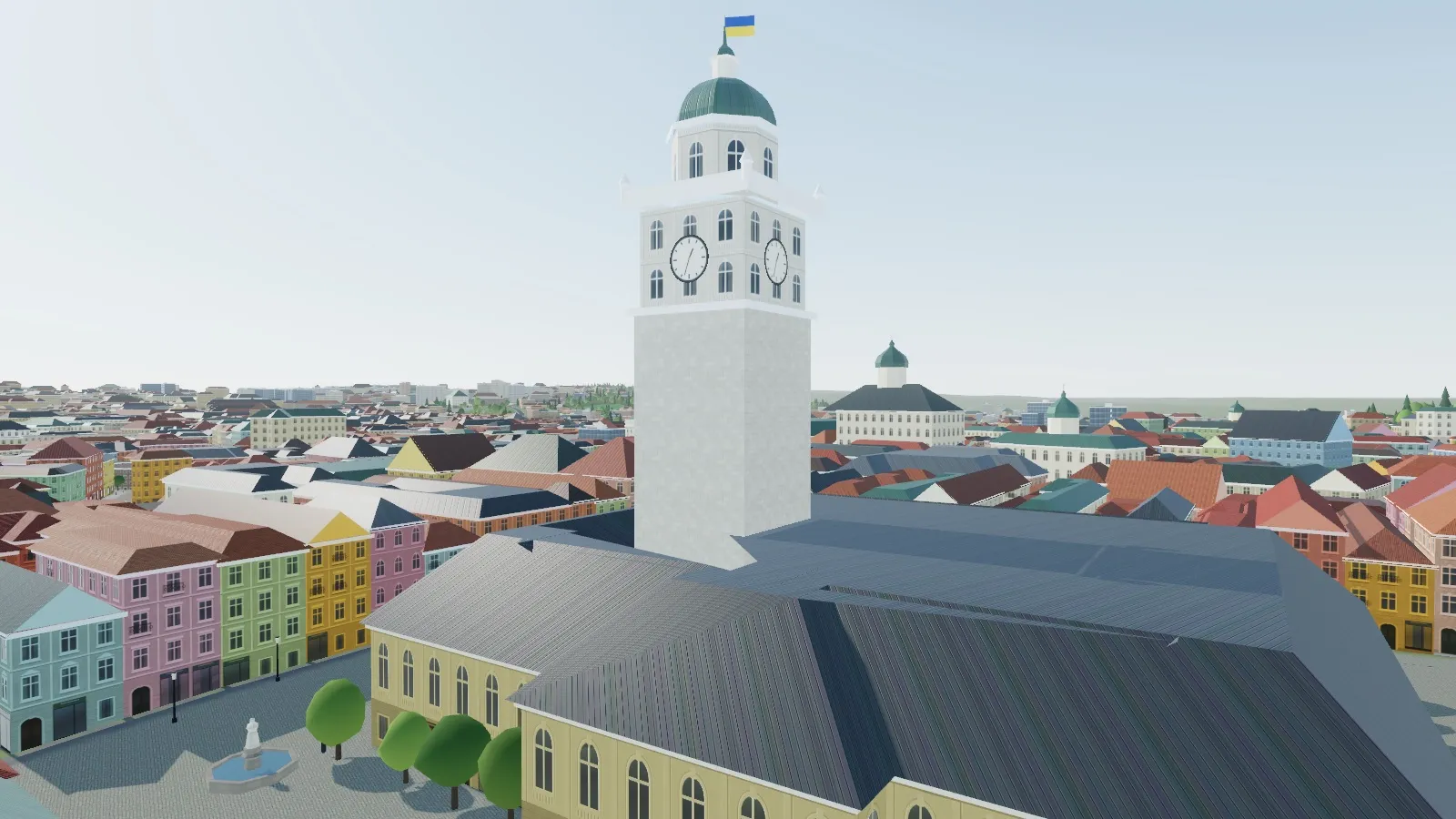 Věž lvovské radnice s ukrajinskou vlajkou nad náměstím Rynok a jeho barevnými domy